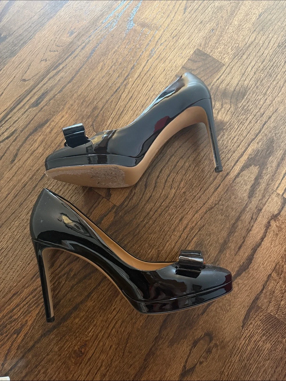 Salvatore Ferragamo Black Patent Vara Bow Pumps with Gold Plaque Accent